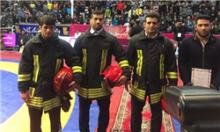 برترین کشتی‌گیران سال ایران با لباس آتش‌نشانان فداکار